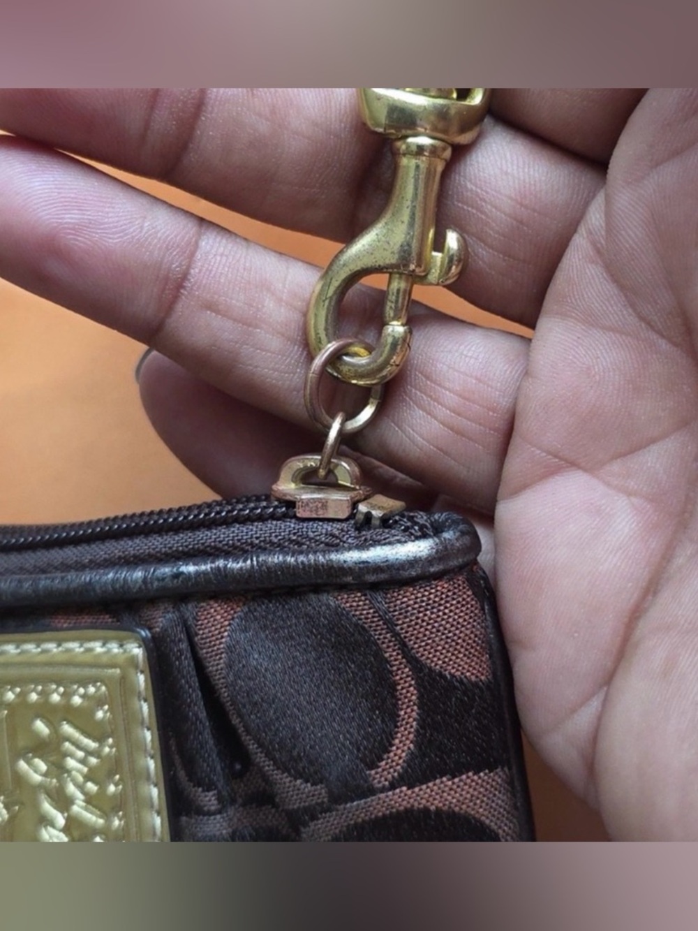 Coach Brown Poppy Signature
Wristlet with Gold Plaque w/ Original Hang Tag GUC - Picture 6 of 14